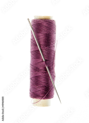 Photo: reel with thread and needle reel with thread and needle