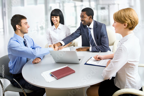 Photo: Business people shaking hands Business people shaking hands