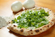 Quadro Italian Pizza, ingredients in the background on a wood table Quadro Italian Pizza, ingredients in the background on a wood table