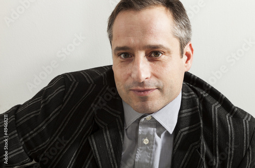 Photo: portrait of adult man portrait of adult man