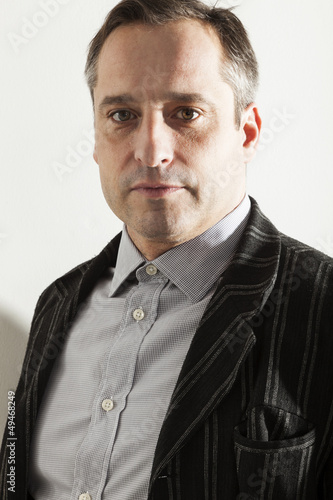 Photo: portrait of adult man portrait of adult man