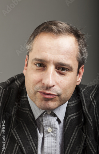 Photo: portrait of adult man portrait of adult man