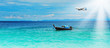 Longtail boat on the sea tropical beach