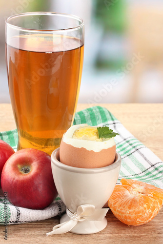 Photo: Light breakfast with boiled egg and glass of juice Light breakfast with boiled egg and glass of juice