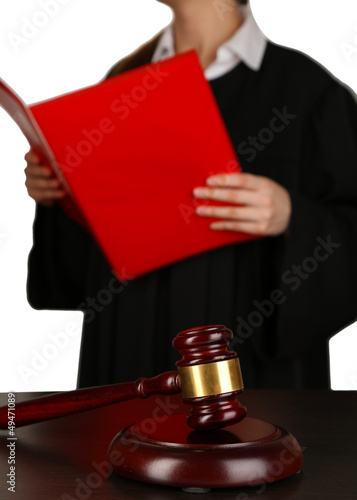 Photo: Judge read verdict on grey background Judge read verdict on grey background