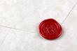 Envelope sealed with a red wax seal