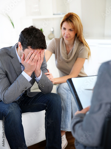 Photo: Couple visiting therapist for assistance Couple visiting therapist for assistance