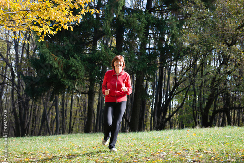 Photo: women jogging in the woods women jogging in the woods