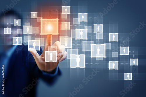 Photo: Image of male touching icon of social network Image of male touching icon of social network