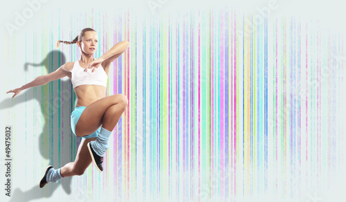 Photo: Image of sport woman jumping Image of sport woman jumping
