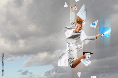 Photo: Image of running businesswoman Image of running businesswoman