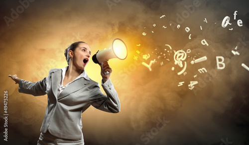 Photo: businesswoman with megaphone businesswoman with megaphone