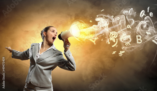 Photo: businesswoman with megaphone businesswoman with megaphone