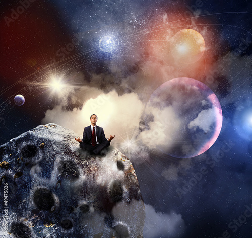 Photo: business man meditating business man meditating