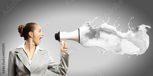 Photo: businesswoman with megaphone businesswoman with megaphone