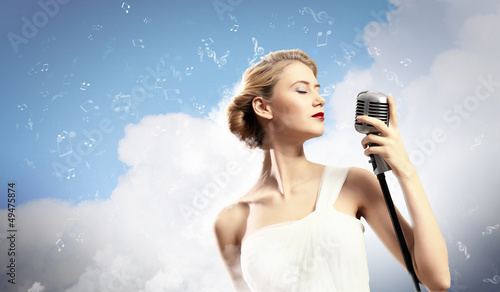 Photo: Female blonde singer Female blonde singer