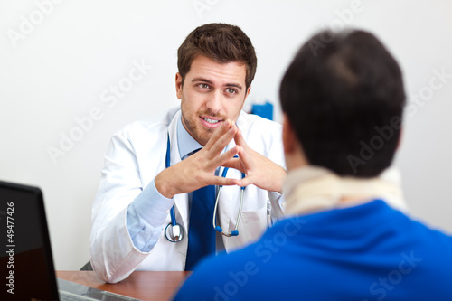 Photo: Doctor talking to a patient Doctor talking to a patient