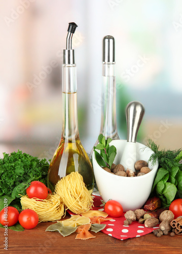 Photo: Composition of mortar, pasta and green herbals, Composition of mortar, pasta and green herbals,