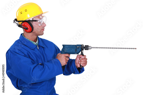 Photo: Worker with drill Worker with drill