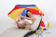 Girl jumping on hammock with beach accessories