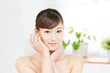 Beautiful asian woman relaxing in the room