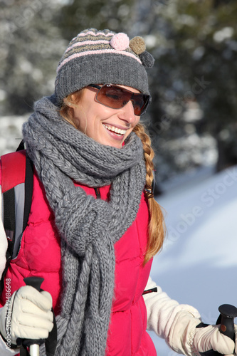 Photo: young woman on a ski vacation young woman on a ski vacation