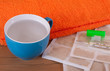 mustard leaf with towel and cup