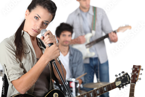 Photo: portrait of a singer in a band portrait of a singer in a band