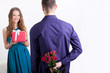 couple giving presents to each other