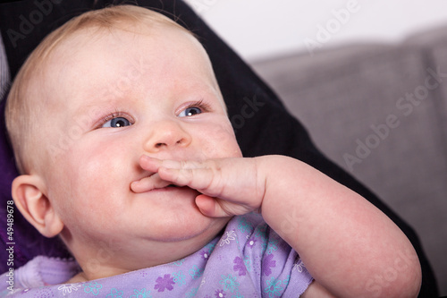 Photo: Baby schnullert at own hand Baby schnullert at own hand