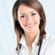 Cheerful female doctor at office