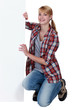 Woman holding a board left blank for your message