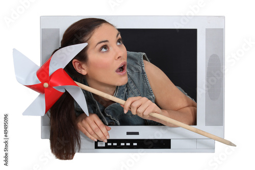 Photo: Woman crossing TV screen Woman crossing TV screen