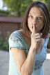 Photo: paranoaic woman requesting silence for privacy paranoaic woman requesting silence for privacy