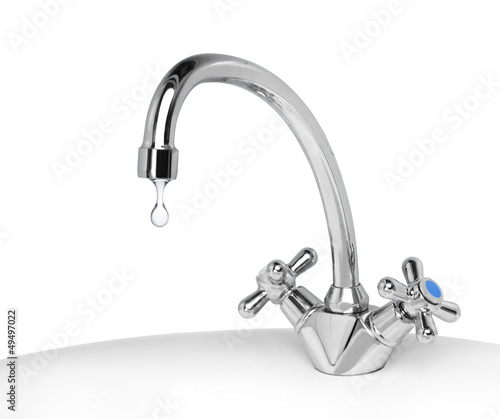 Photo: Water dripping from a tap Water dripping from a tap