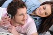 Couple listening to music together