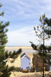 Beach hut and trees