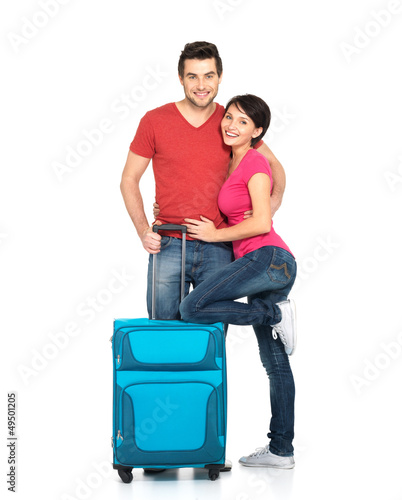 Photo: couple with suitcase going to travel couple with suitcase going to travel