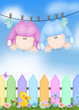 babies hanging from clotheline