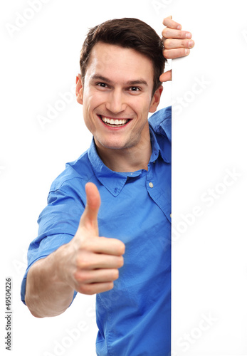 Photo: Young man with thumbs up Young man with thumbs up