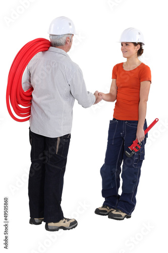 Photo: Tradespeople shaking hands Tradespeople shaking hands