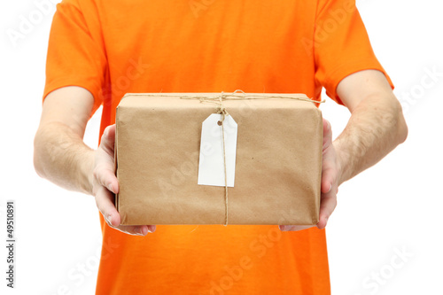 Photo: courier with parcel box, isolated on white courier with parcel box, isolated on white