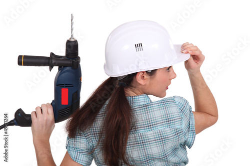 Photo: Little girl with drill Little girl with drill