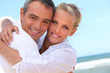 Photo: Embracing on the beach Embracing on the beach
