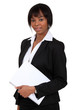 Woman stood with folder