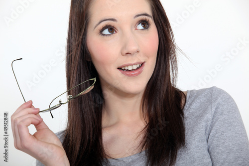 Photo: Brunette with glasses in hand Brunette with glasses in hand