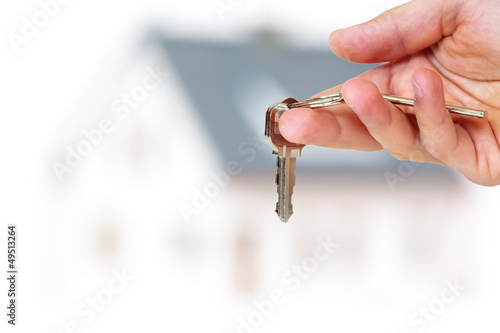 Photo: handing house keys handing house keys