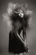 Young girl with a volume fashionable hairstyle