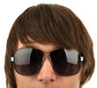 Head of the young man in sunglasses
