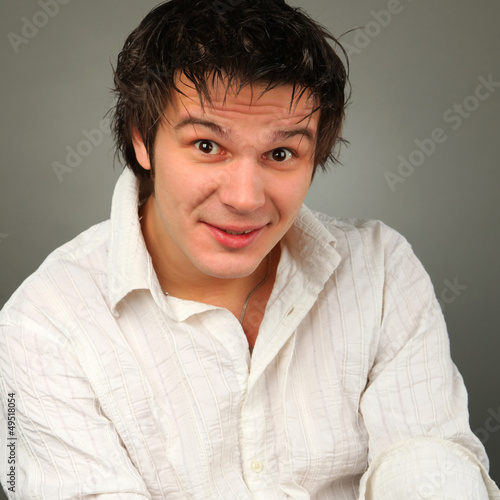 Photo: Portrait of young smiling man Portrait of young smiling man